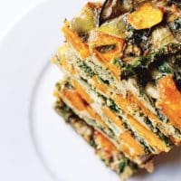 A stack of farmers' market vegetable egg bake on a plate.