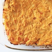 buffalo chicken casserole close on a deep glass baking dish