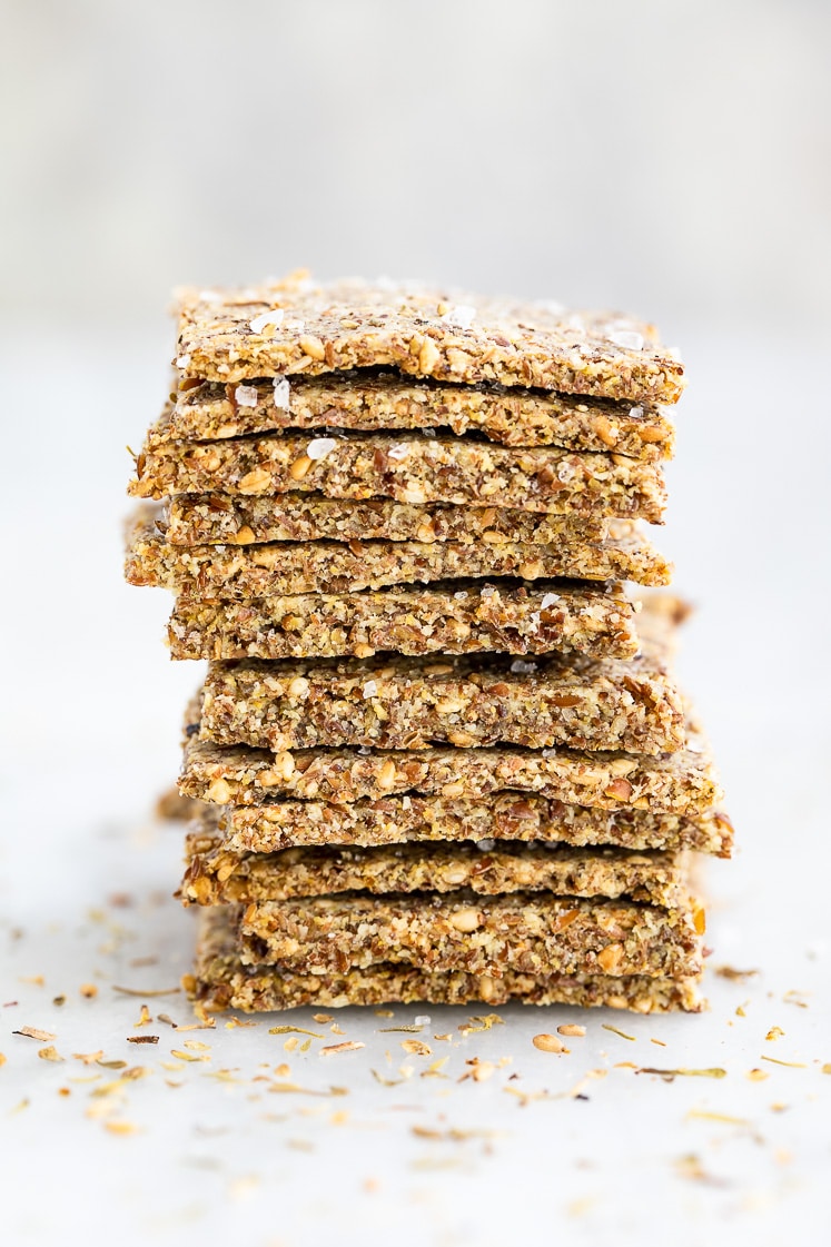 a stack of multi grain low carb crackers