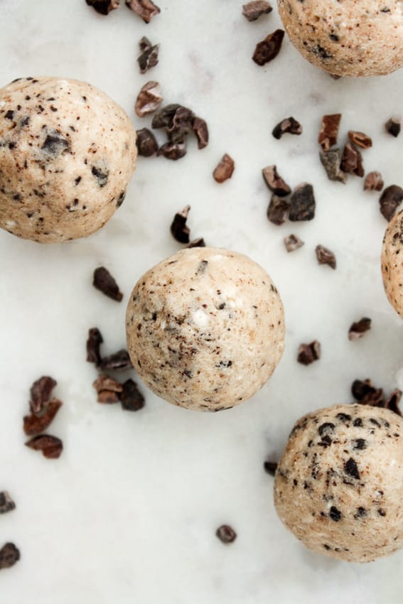 close up of three chocolate chip cookie dough fat bombs