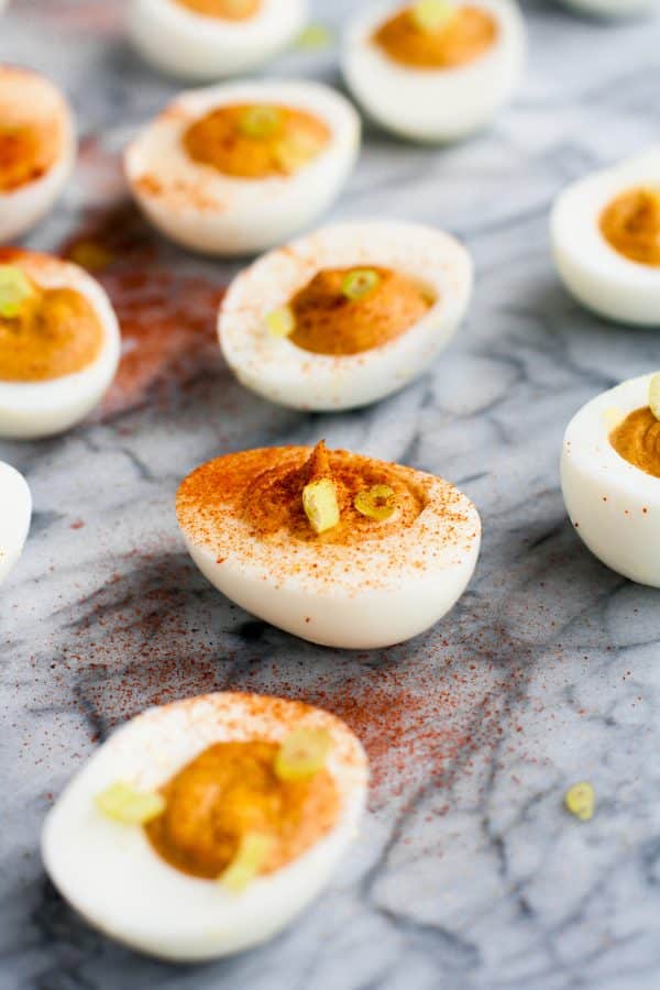 close-up-shot-of-buffalo-deviled-egg-on-marble-board