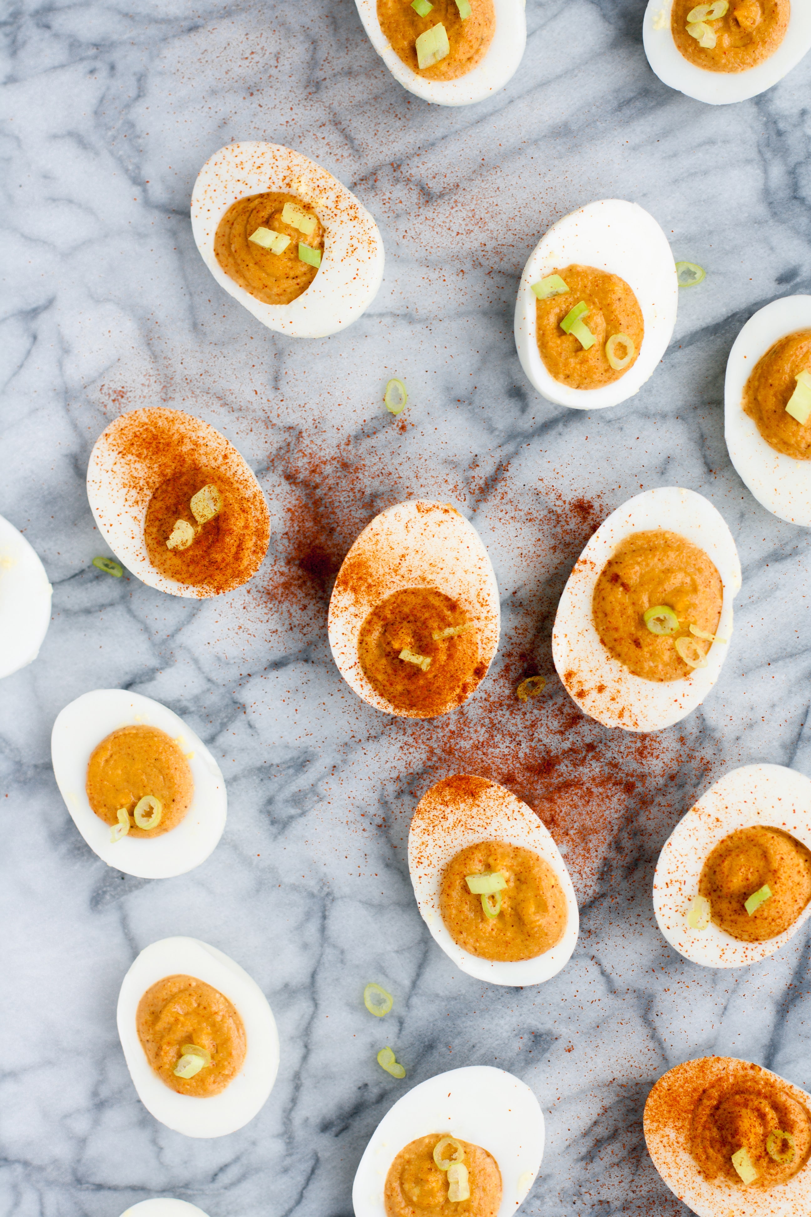 overhead-shot-of-buffalo-deviled-eggs-on-marble-board