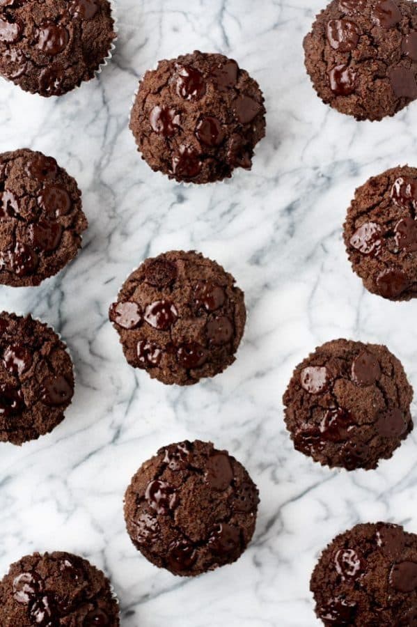 overhead-shot-on-marble-baking-board-of-Low-Carb-Triple-Chocolate-Zucchini-Muffins