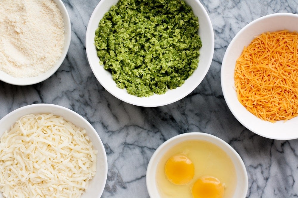 ingredients-in-bowls-on-marble-board-for-Low-Carb-Zucchini-Pizza-Casserole