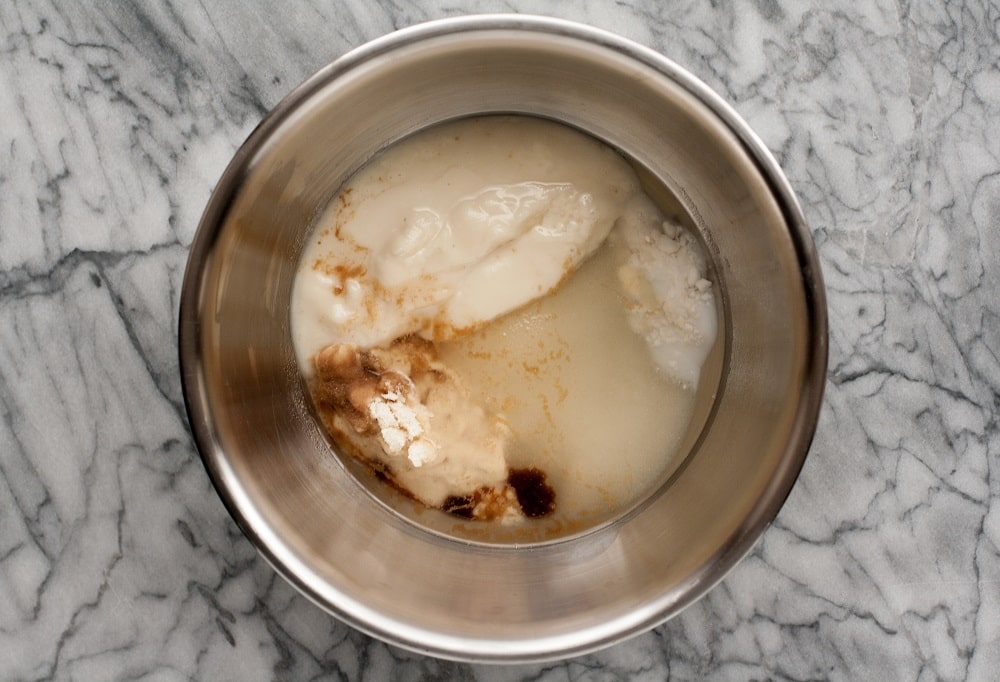 ingredients-for-Low-Carb-Coconut-Blondies-in-stainless-steel-mixing-bowl-on-marble-board
