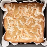 baked-Low-Carb-Coconut-Blondies-out-of-the-oven-in-baking-pan