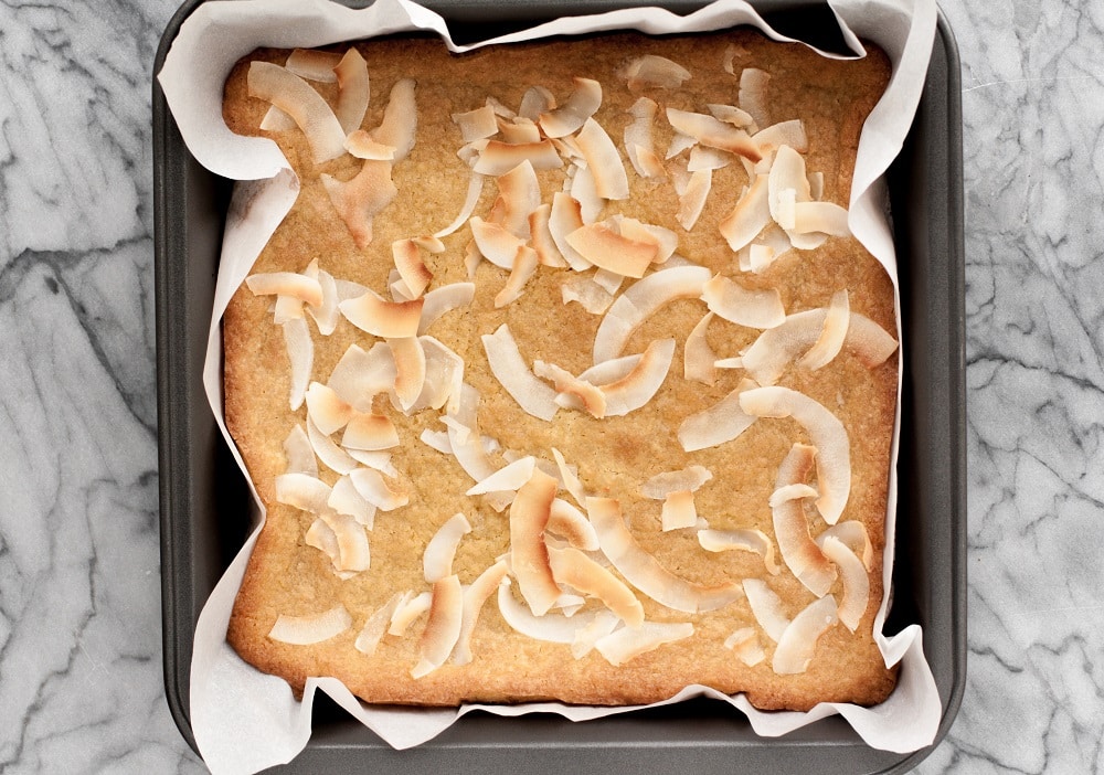 baked-Low-Carb-Coconut-Blondies-out-of-the-oven-in-baking-pan