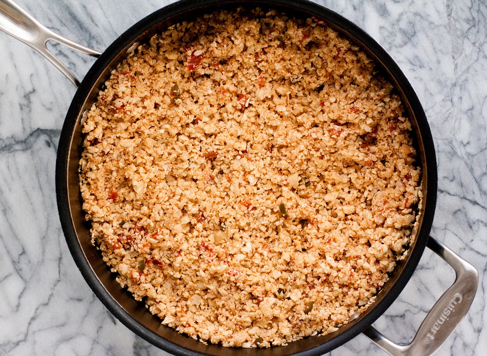 mexican-cauliflower-rice-in-black-pan-on-marble-board