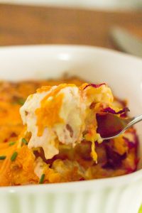 Keto Side Dish Recipes - cheesy radish casserole scooped with a spoon