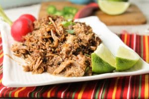 instant pot carnitas with lime wedges and turnips 