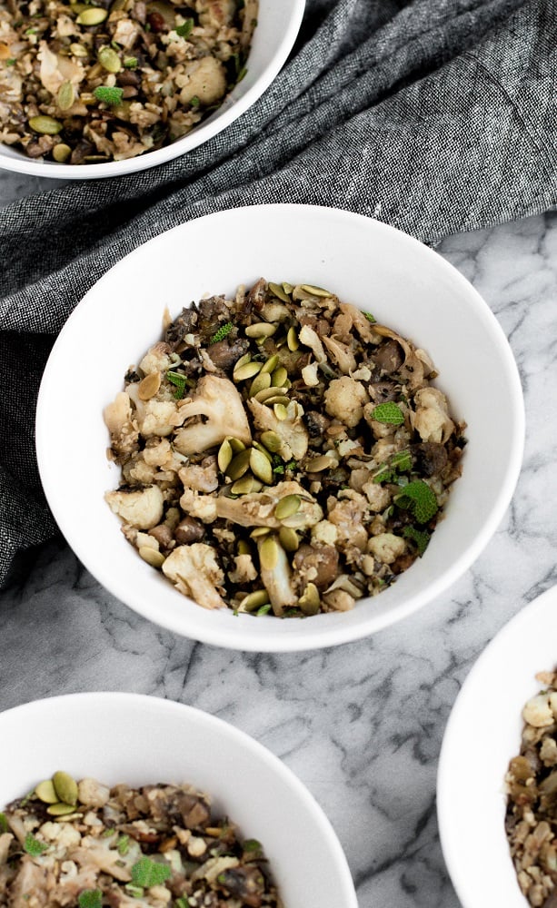 four bowls of sautéed low carb stuffing on top of a table