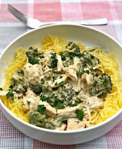 instant pot spaghetti squash chicken alfredo  served in a bowl beside a fork