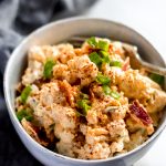 loaded cauliflower salad in ceramic bowl single shot
