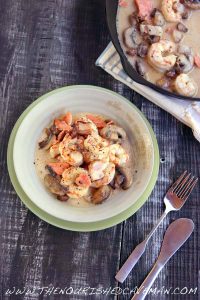 Bowl and Skillet of Creamy Shrimp and Bacon Skillet with silverware