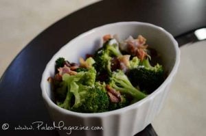 Broccoli Bacon Salad with Onions and coconut cream in a white dish