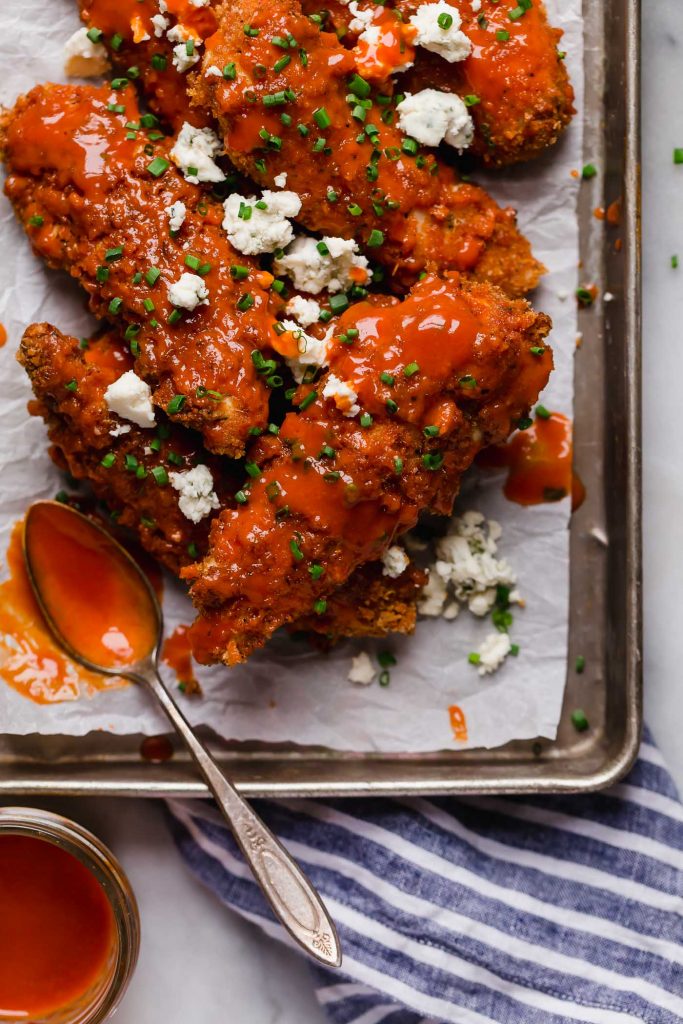 buffalo chicken tenders with blue cheese crumbles and fresh chopped chives