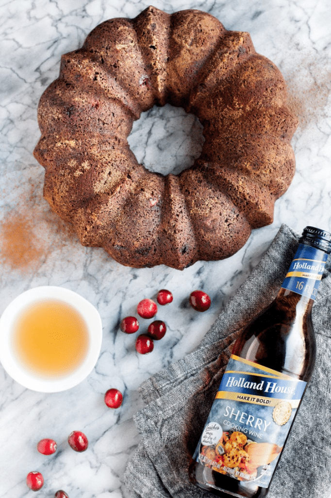 featured image overhead shot of cranberry bundt cake with Holland House Cooking Wine