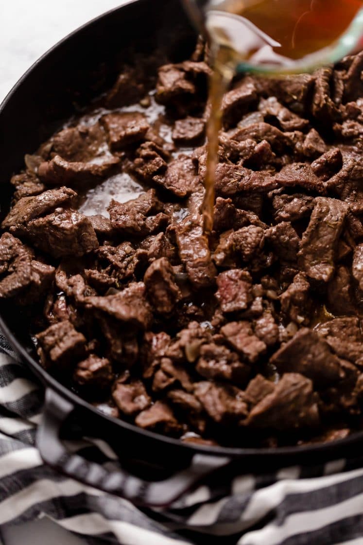 beef broth poured onto chopped cooked beef in a large sauce pan