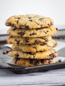 stack of 6 keto chocolate chip cookies on a baking sheeet