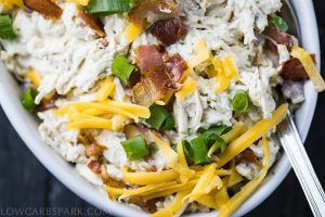 bowl of easy crack chicken with a spoon