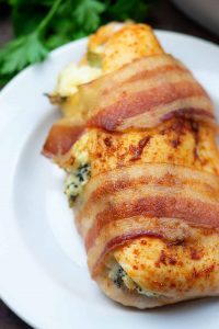 Broccoli and Cheese Stuffed Chicken on a white dinner plate