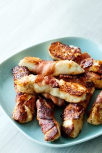 Bacon-Wrapped Halloumi Cheese-on-a-square-shaped-plate