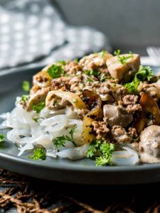Side View of Easy One Pot Keto Ground Beef Stroganoff on a dark gray plate