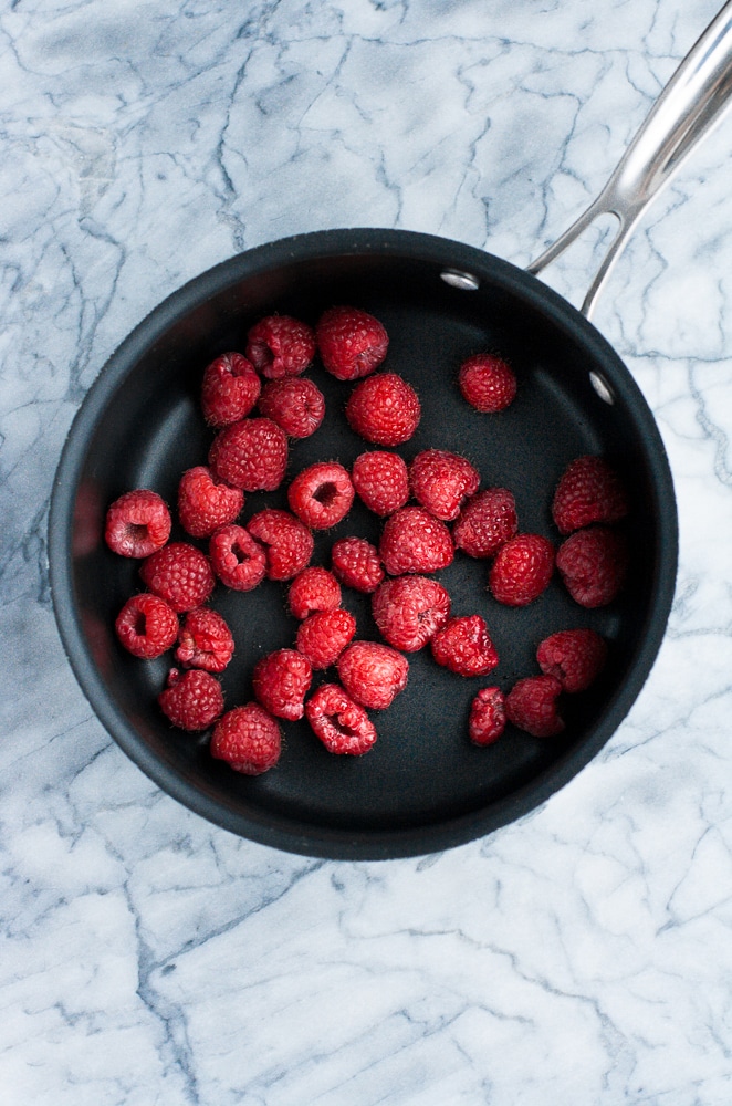 fresh raspberries on a saucepan