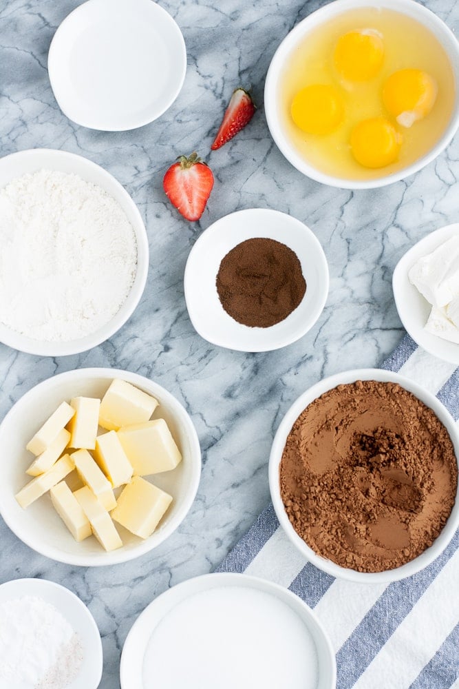 Low Carb Chocolate Strawberry Cupcakes ingredients neatly assembled on a kitchen counter