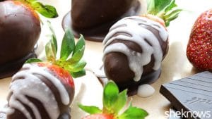 3 Ingredient Chocolate Covered Strawberries beside a piece of chocolate