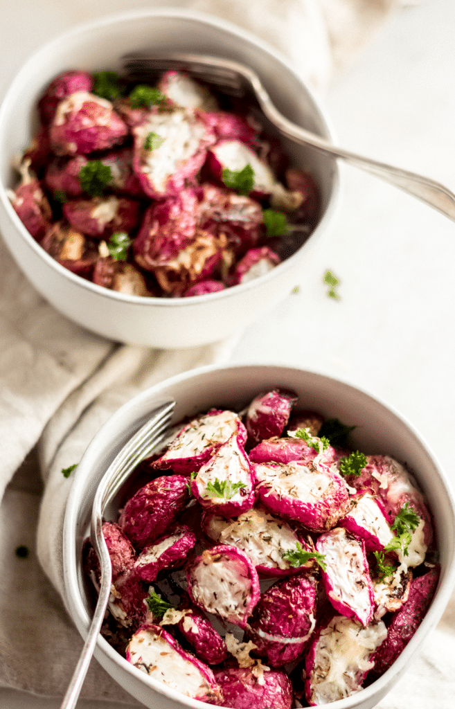 keto roasted radishes in bowl with fork