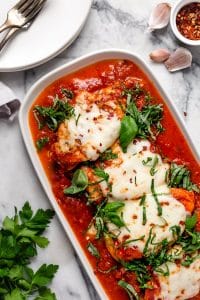 instant pot chicken parmesan topped with basil