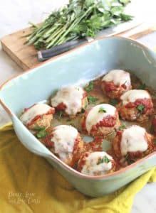 low carb chicken parmesan meatballs in a sky blue dish