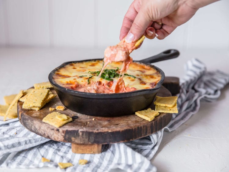 skillet with chicken parmesan dip