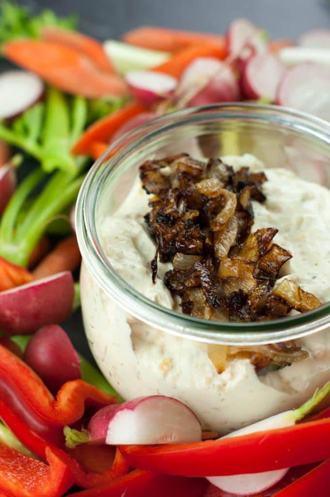 homemade french onion dip surrounded by fresh veggies