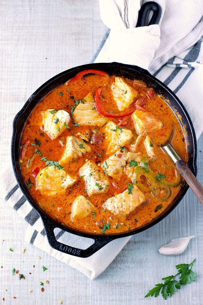 fish stew in a cast iron skillet