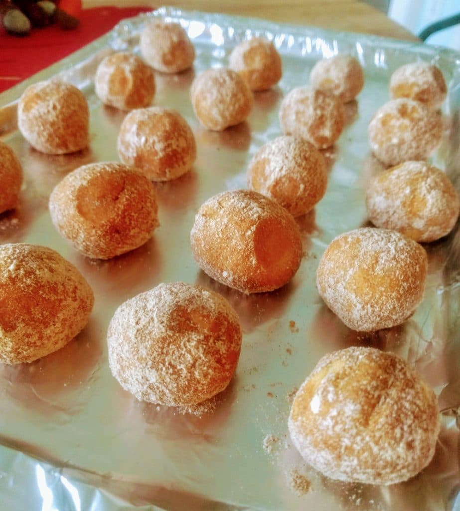 snickerdoodle fat bombs on a foil-lined pan