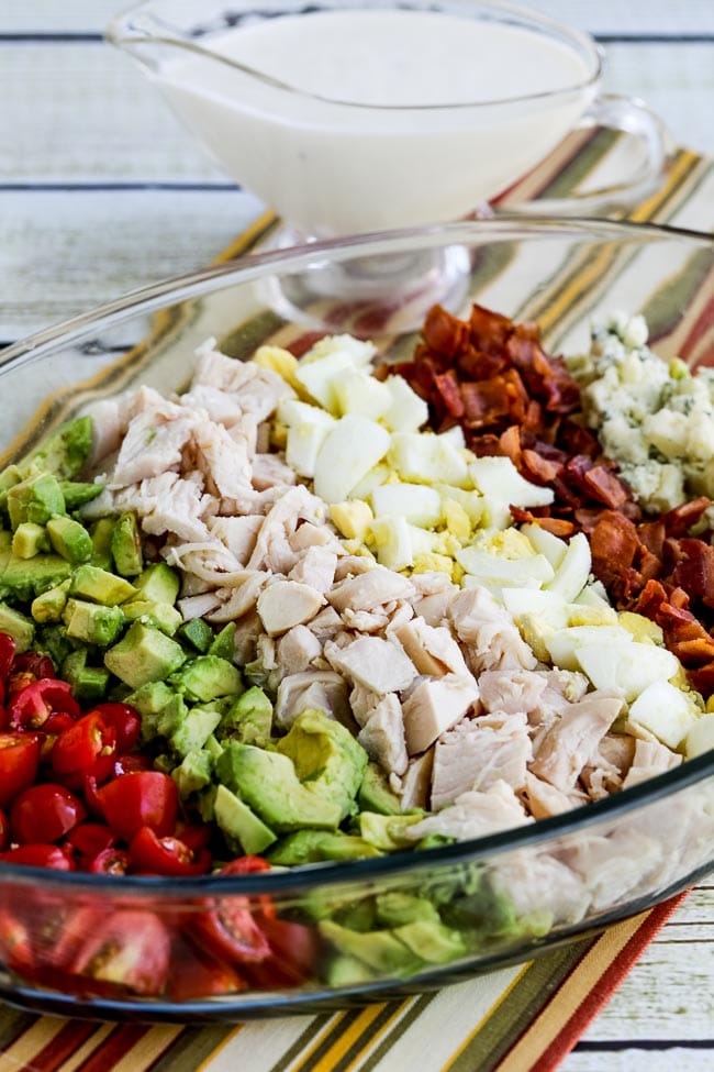 lettuce-free keto cobb salad in a glass dish with dressing on the side