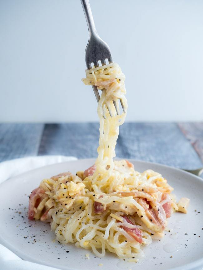 keto carbonara pasta being swirled on a fork