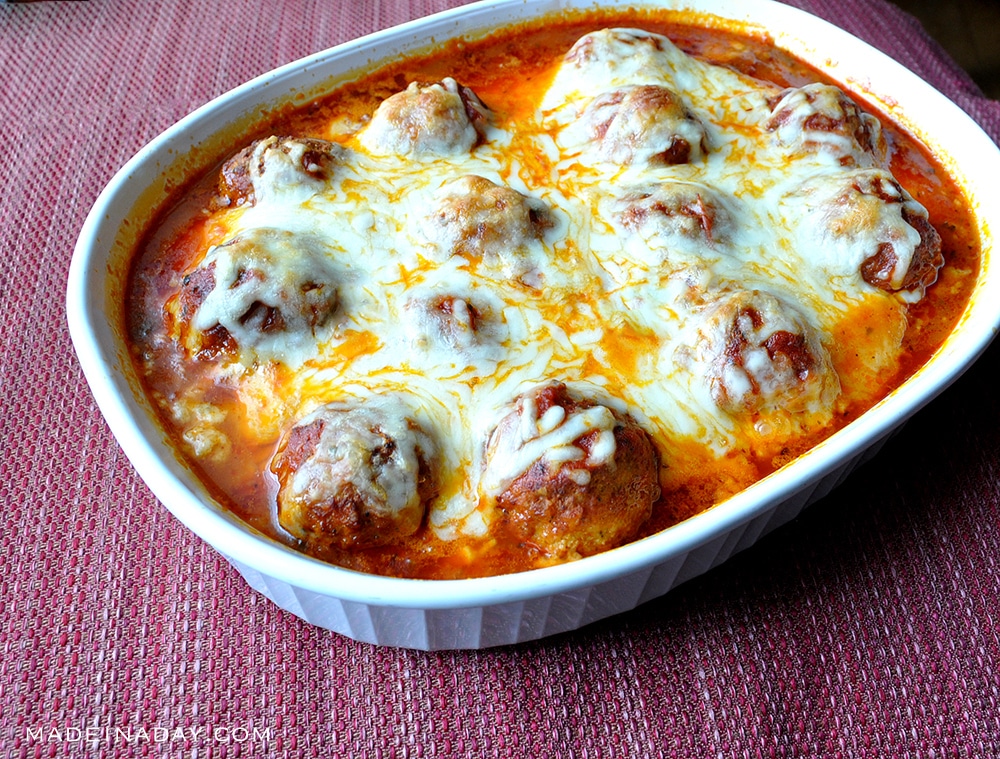 low carb baked zoodles and meatballs in a casserole dish