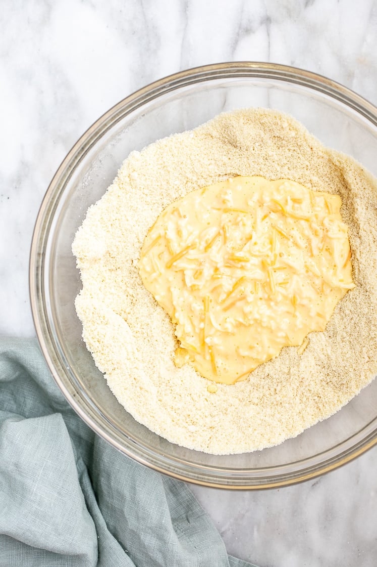 Low-Carb Bacon Cheddar Jalapeño Scones wet and dry ingredients in a mixing bowl