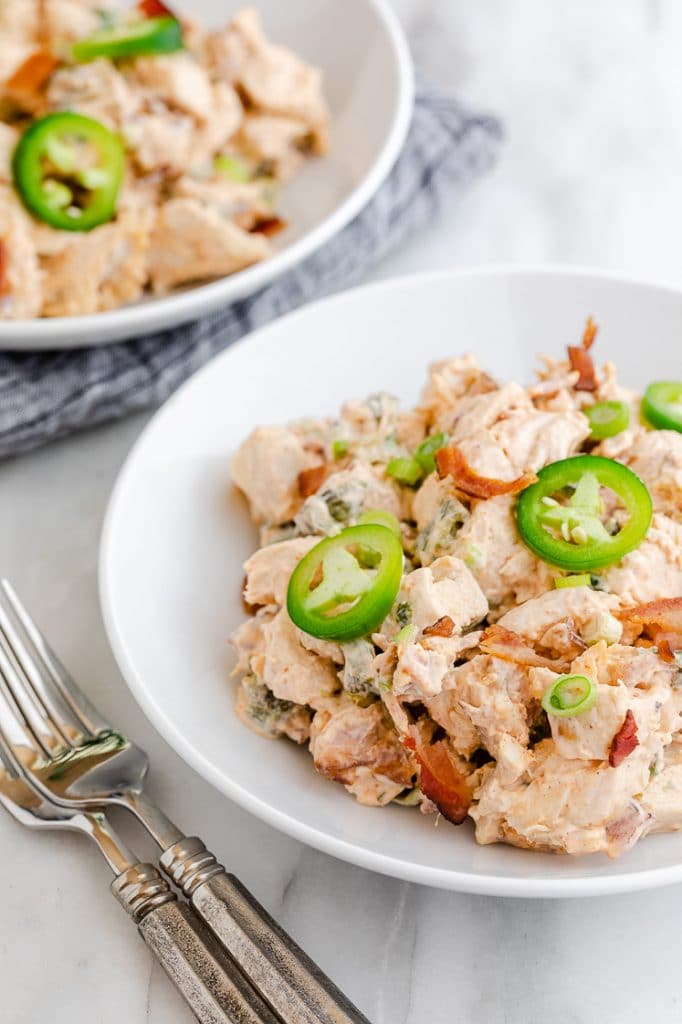 2 servings of Jalapeño Popper Chicken Salad atop a marble kitchen counter