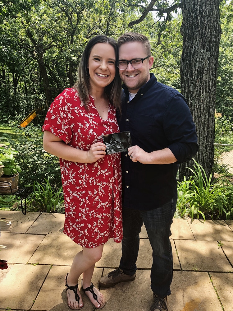 outdoor photo of couple for pregnancy announcement