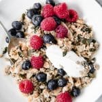 featured recipe image Nut Free Keto Cereal in a bowl with raspberries and blueberries