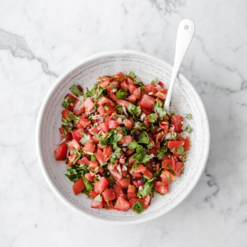 hero shot of easy keto salsa atop a marble kitchen counter