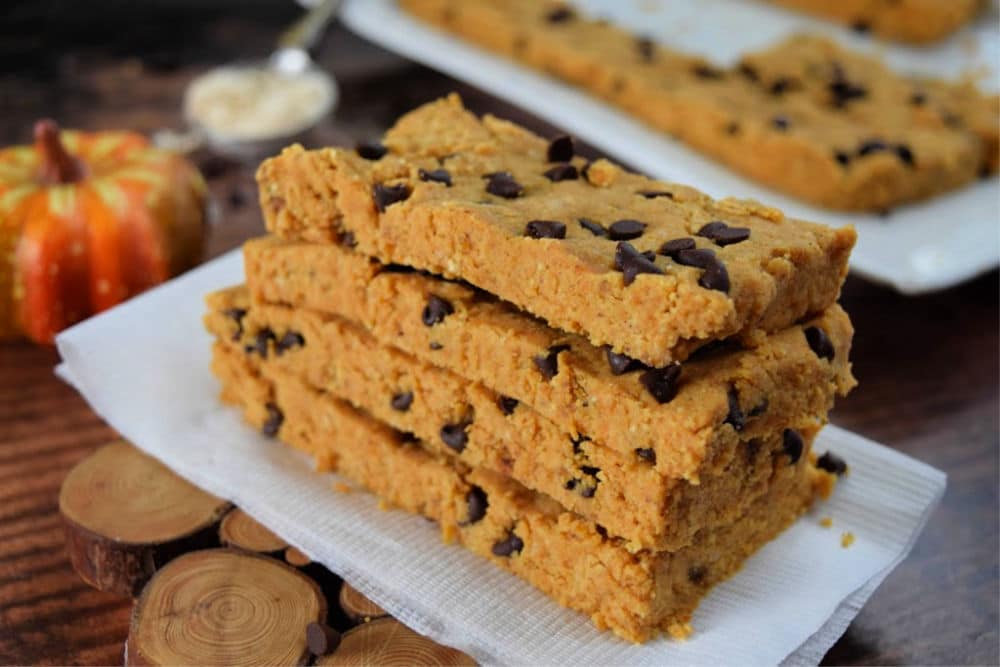 4 low carb chocolate chip pumpkin protein bars stack on top of each other