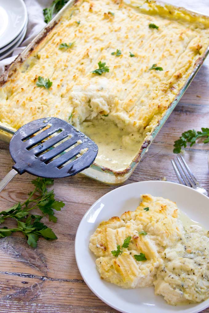 one serving of low-carb fish pie atop a wooden table