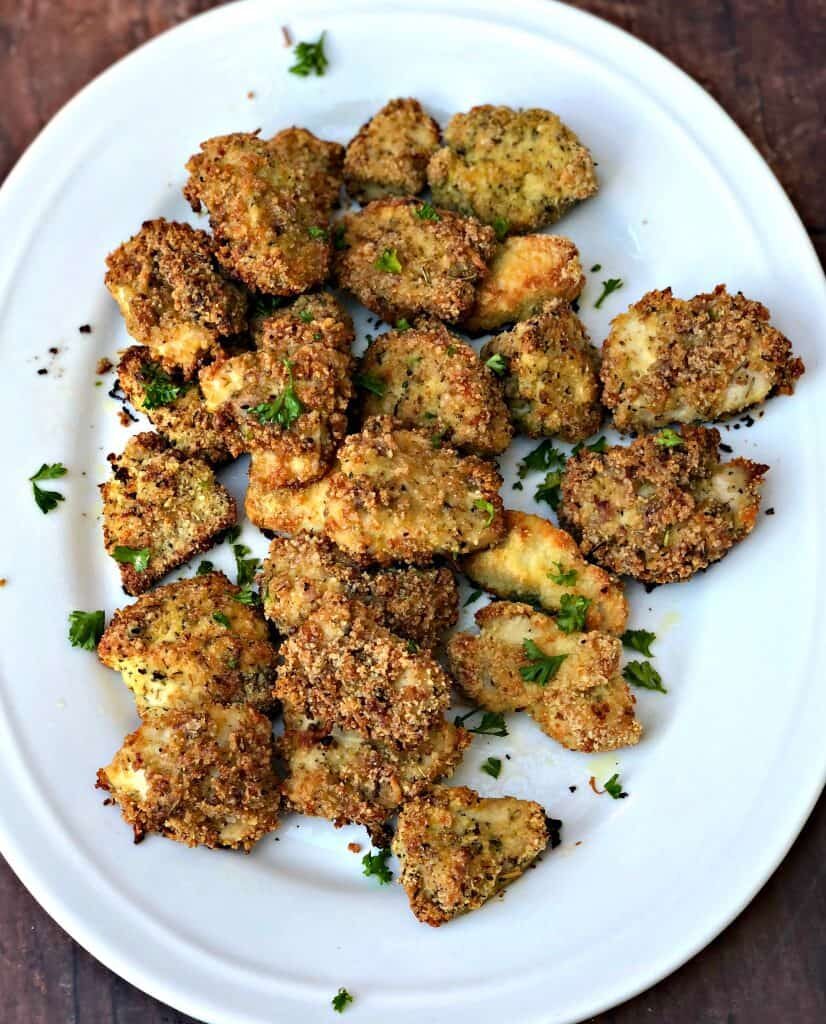 overhead shot of a plate full of bacon parmesan keto chicken nuggets