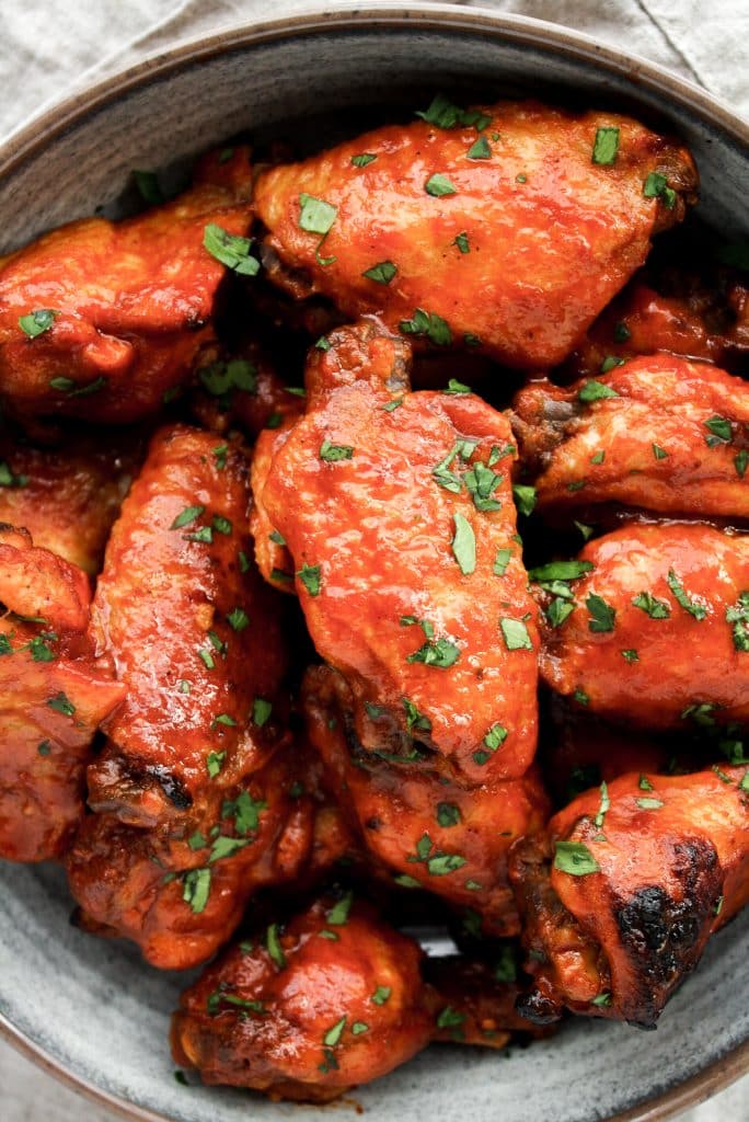 close up shot of Low-Carb Chicken Wings with Sweet & Spicy Barbecue sauce