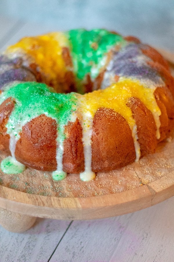 Mardi Gras King Cake atop a marble kitchen table